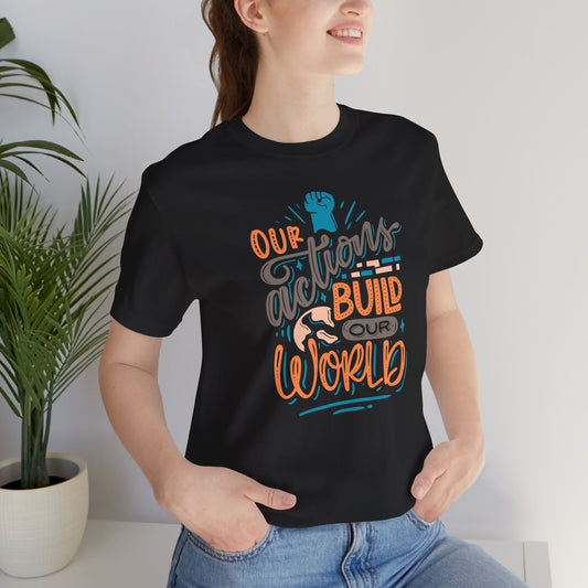 Camiseta gráfica NUESTRAS ACCIONES CONSTRUYEN NUESTRO MUNDO hombre/mujer